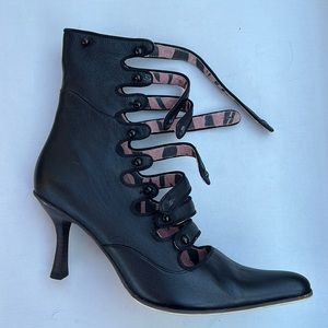 Gorgeous black leather Irregular Choice booties. Black size 9. New in box.